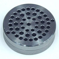 Metal Trap Twin Filter Disc with 0.060" Opening. Disks are 1-5/8" OD. Material: 4140 Steel 35-38 Rc